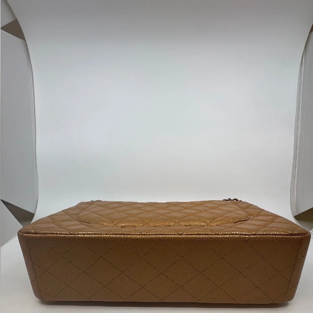 Chanel caviar Maxi double flap in toffee.